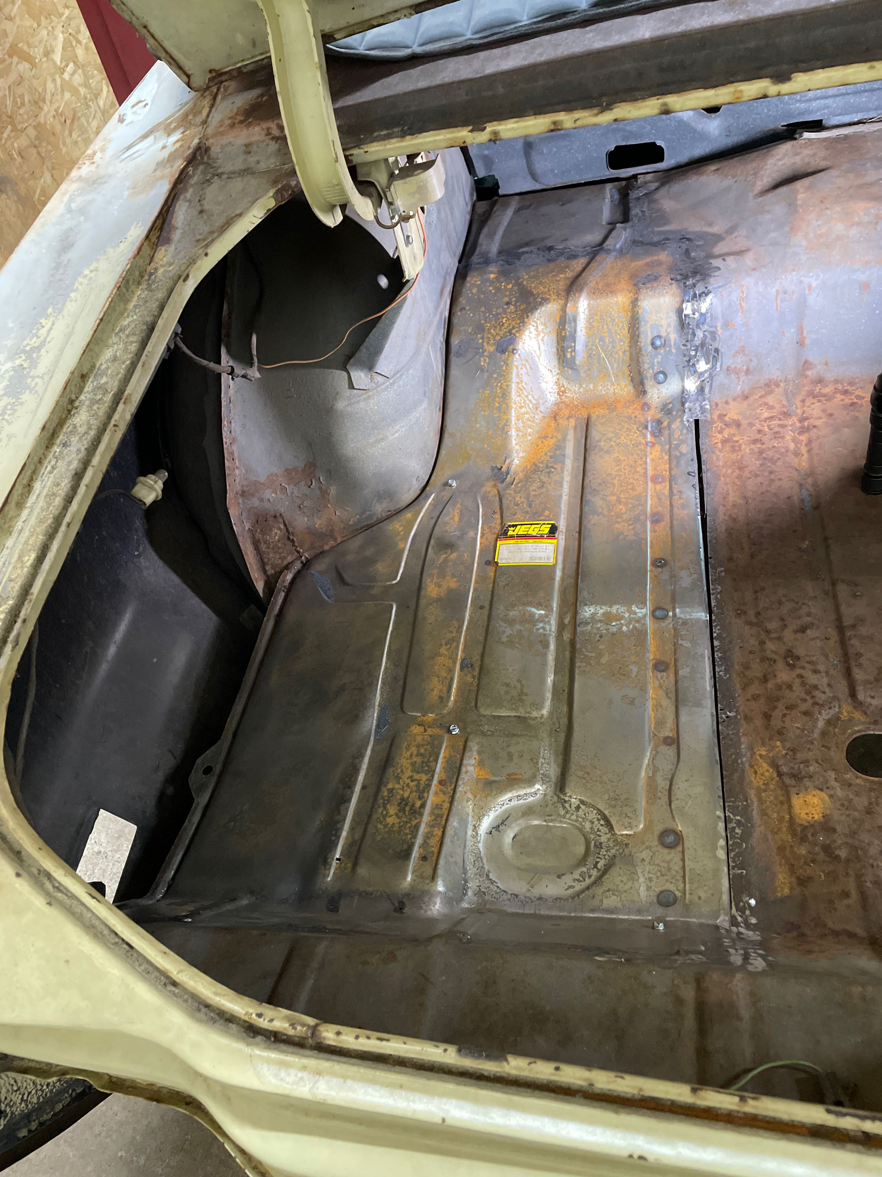 Rust repair and restoration on an Oldsmobile Cutlass trunk