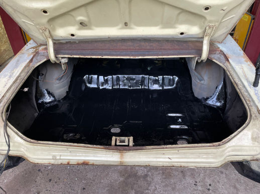 Auto restoration specialists repairing classic vehicles at Wrenchmasters